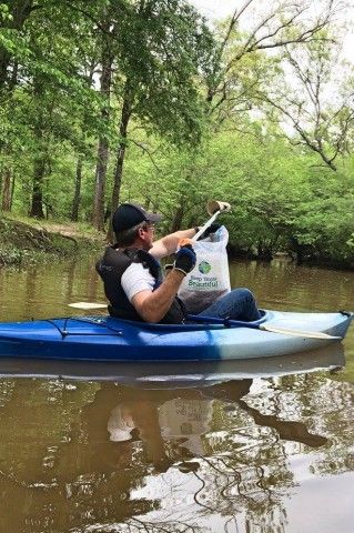 River cleanup on canoe