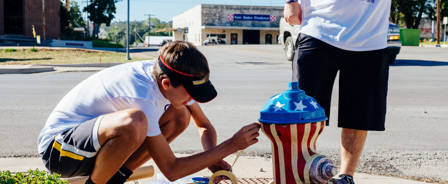 kids decorate fire hydrant red white + blue