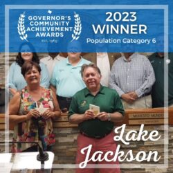 Lake Jackson: volunteer and staff pose with city council to celebrate KTB awards